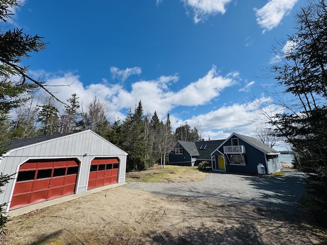 detached garage featuring driveway