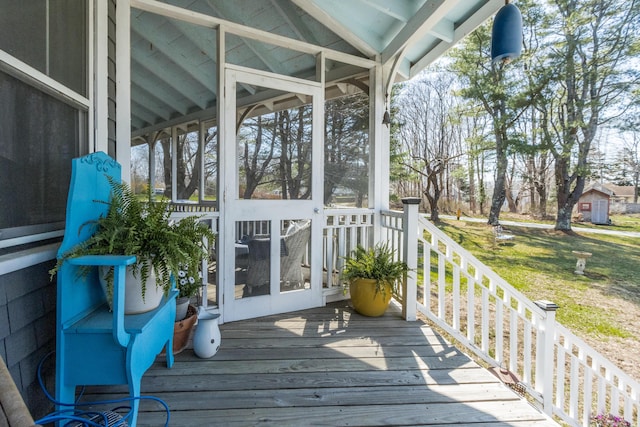 wooden terrace with a sunroom