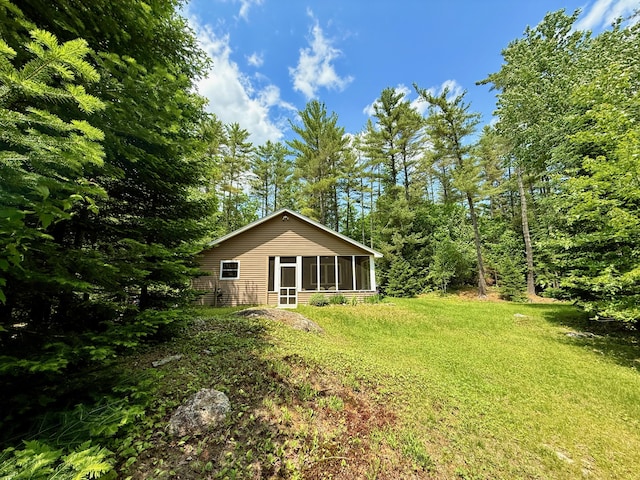 52 Main Rd, Chesterville, ME 04938 - view of green lawn featuring a sunroom