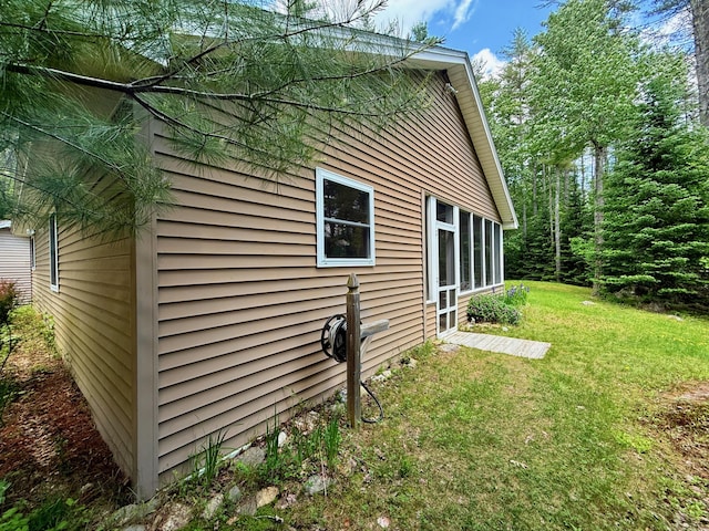 52 Main Rd, Chesterville, ME 04938 - view of side of home featuring a lawn