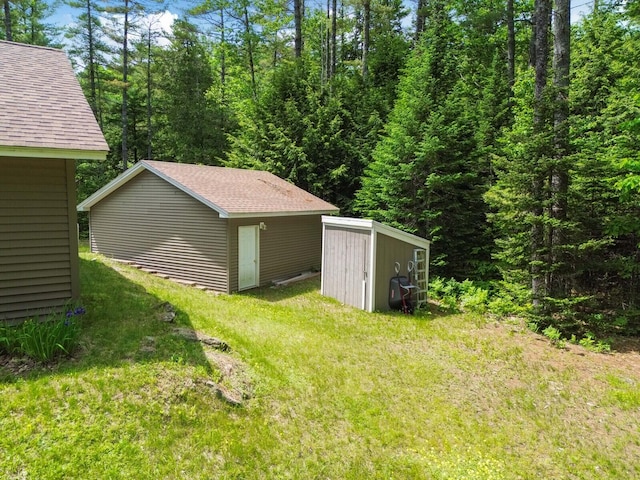 52 Main Rd, Chesterville, ME 04938 - view of grassy yard featuring a storage unit