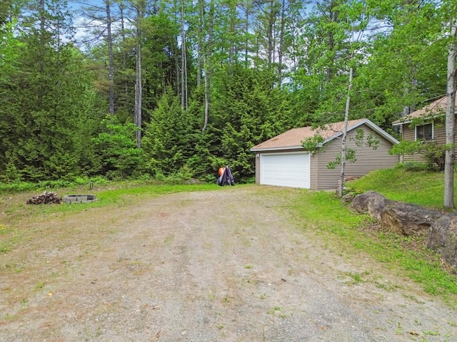 52 Main Rd, Chesterville, ME 04938 - view of yard with an outbuilding and a detached garage