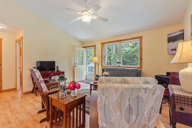 52 Main Rd, Chesterville, ME 04938 - living area with light wood finished floors, vaulted ceiling, and a ceiling fan