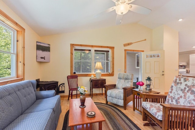 52 Main Rd, Chesterville, ME 04938 - living room with lofted ceiling, light wood-type flooring, healthy amount of natural light, and a ceiling fan