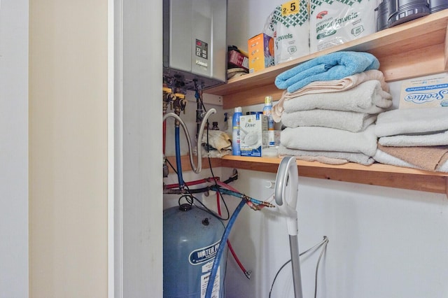52 Main Rd, Chesterville, ME 04938 - walk in closet with tankless water heater