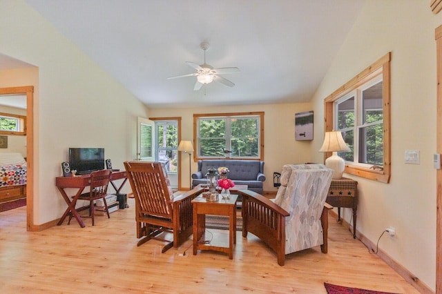 52 Main Rd, Chesterville, ME 04938 - living room with plenty of natural light, light wood finished floors, ceiling fan, and vaulted ceiling