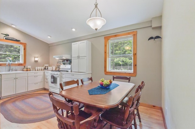52 Main Rd, Chesterville, ME 04938 - dining space with healthy amount of natural light, light wood-type flooring, recessed lighting, and lofted ceiling