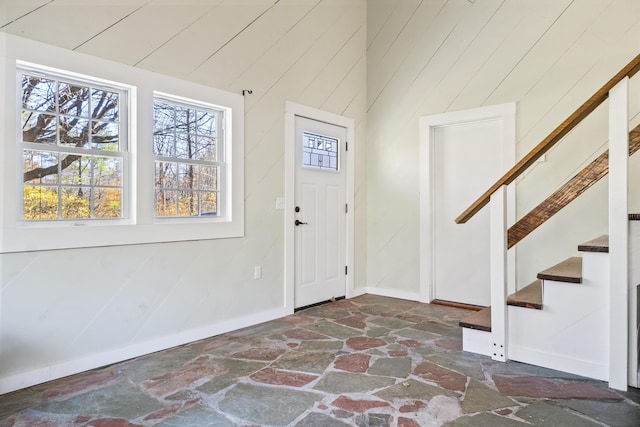 2 Mountain View Ln, Readfield, ME 04355 - foyer featuring baseboards, stairs, vaulted ceiling, and stone tile floors