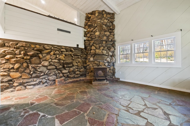 2 Mountain View Ln, Readfield, ME 04355 - unfurnished living room with high vaulted ceiling, wooden ceiling, beam ceiling, a wood stove, and stone floors