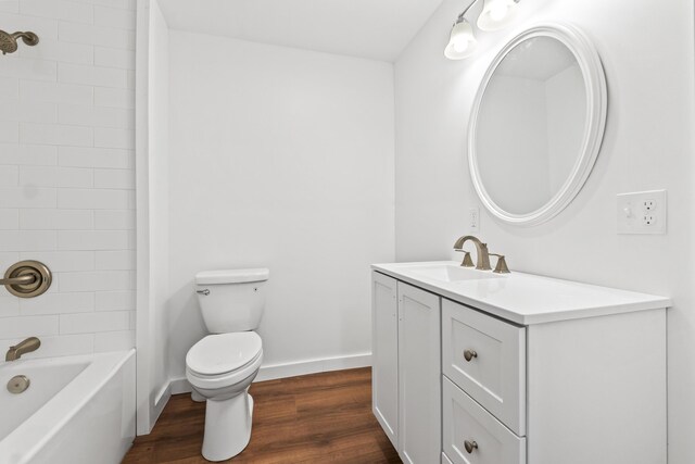 2 Mountain View Ln, Readfield, ME 04355 - full bathroom featuring vanity, toilet, baseboards, shower / tub combination, and wood finished floors