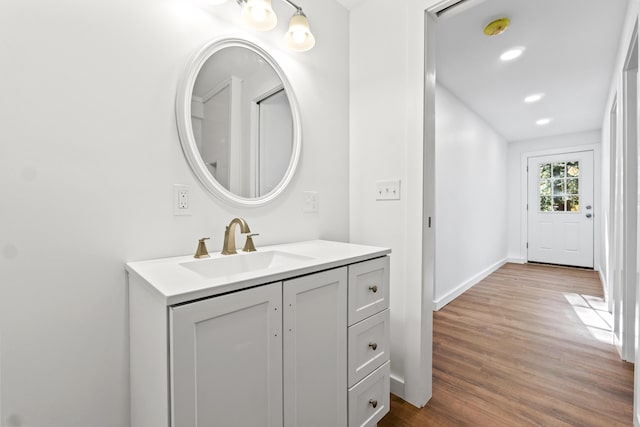 2 Mountain View Ln, Readfield, ME 04355 - bathroom featuring baseboards, wood finished floors, recessed lighting, and vanity