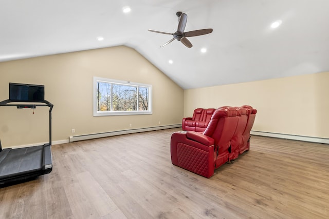 2 Mountain View Ln, Readfield, ME 04355 - living area featuring vaulted ceiling, ceiling fan, wood finished floors, and a baseboard heating unit