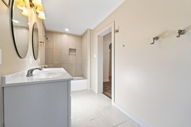 2 Mountain View Ln, Readfield, ME 04355 - bathroom with shower / bathing tub combination, vanity, and baseboards