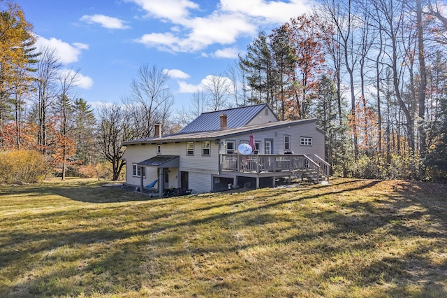 2 Mountain View Ln, Readfield, ME 04355 - back of property featuring a lawn, metal roof, a chimney, and a deck