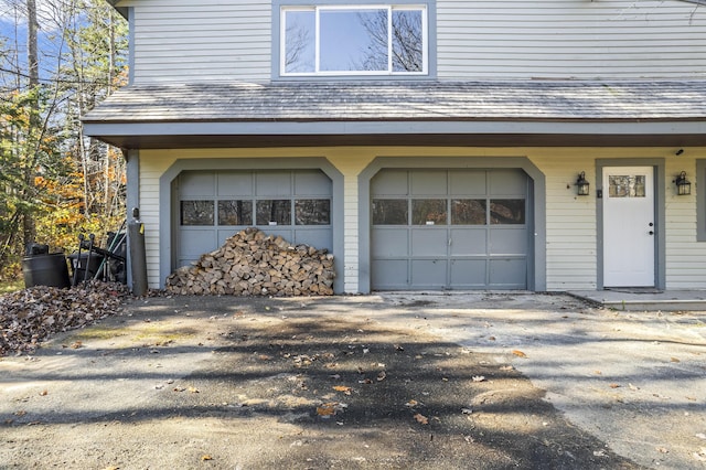 2 Mountain View Ln, Readfield, ME 04355 - garage featuring driveway