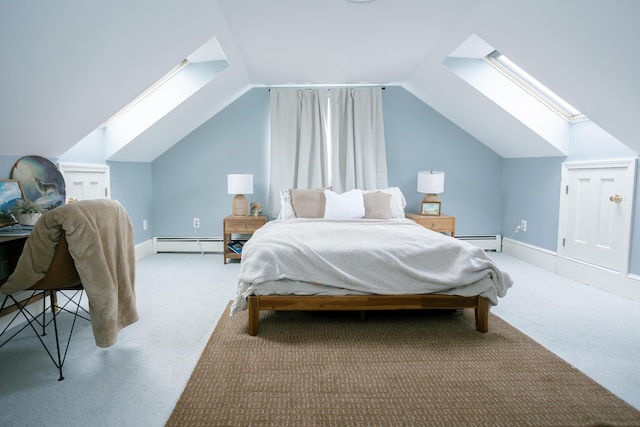 carpeted bedroom with baseboards, a baseboard heating unit, and vaulted ceiling with skylight