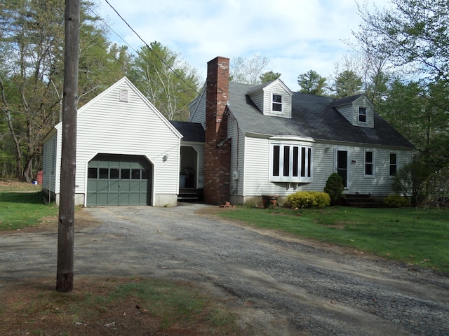 365 Country Club 3rd Rd, Sanford, ME 04073 - cape cod-style house with dirt driveway, an attached garage, a chimney, and a front lawn