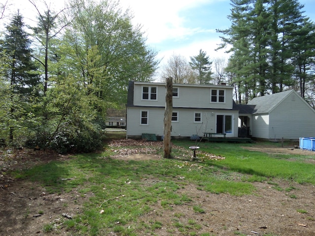 365 Country Club 3rd Rd, Sanford, ME 04073 - back of property featuring a chimney and a lawn