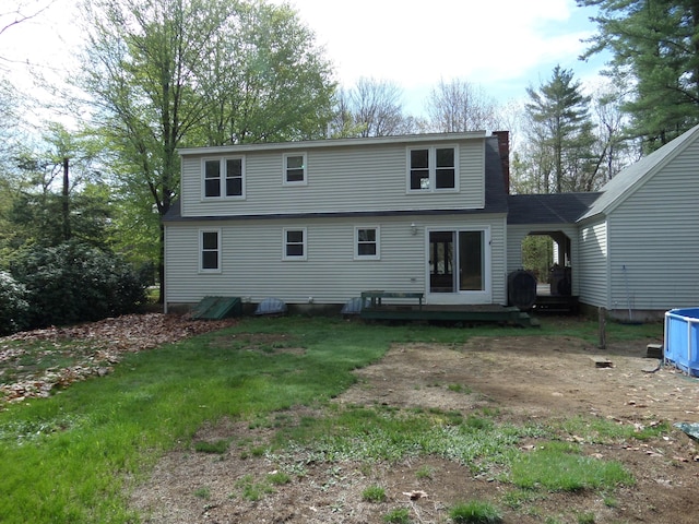 365 Country Club 3rd Rd, Sanford, ME 04073 - rear view of house featuring a deck and a chimney