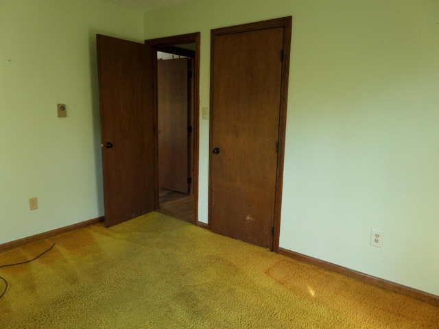 365 Country Club 3rd Rd, Sanford, ME 04073 - unfurnished bedroom featuring carpet flooring, a closet, and baseboards