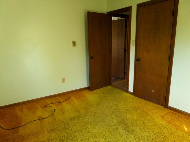 365 Country Club 3rd Rd, Sanford, ME 04073 - unfurnished bedroom featuring carpet flooring, baseboards, and a closet
