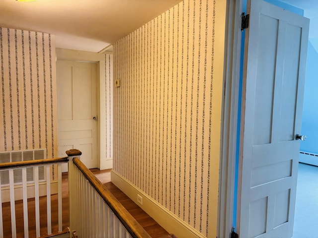 20 Water St, Winterport, ME 04496 - corridor featuring wallpapered walls and baseboard heating