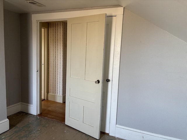 20 Water St, Winterport, ME 04496 - unfurnished bedroom with lofted ceiling and visible vents