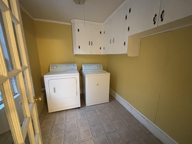 20 Water St, Winterport, ME 04496 - laundry area featuring independent washer and dryer, baseboards, ornamental molding, tile patterned floors, and cabinet space