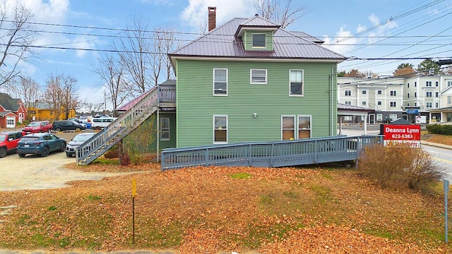 86 Western Ave, Augusta, ME 04330 - exterior space featuring stairway and a chimney
