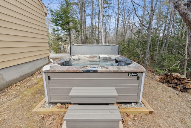 exterior details featuring a jacuzzi