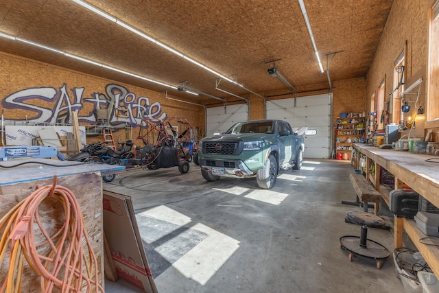 garage with a workshop area