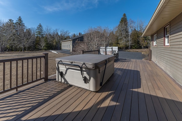deck featuring a hot tub