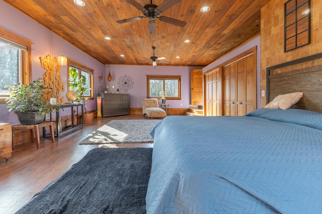 bedroom with wood finished floors, wooden ceiling, and recessed lighting
