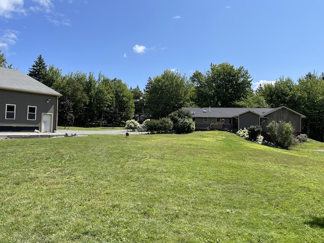view of yard with a garage