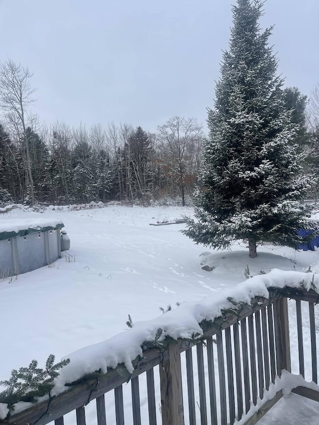 view of yard covered in snow