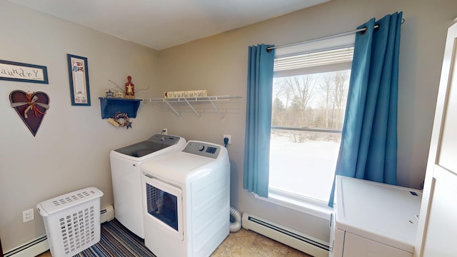 washroom featuring independent washer and dryer, laundry area, a baseboard heating unit, and a baseboard radiator