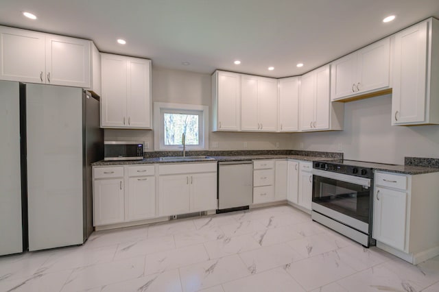 313 W Neck Rd, Nobleboro, ME 04555 - kitchen with appliances with stainless steel finishes, a sink, light marble finish floors, white cabinets, and recessed lighting