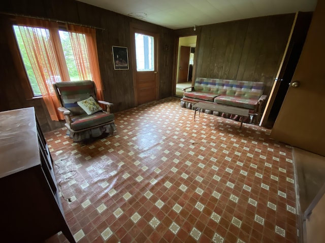 927 Van Buren Rd, Caswell, ME 04750 - living area featuring wood walls