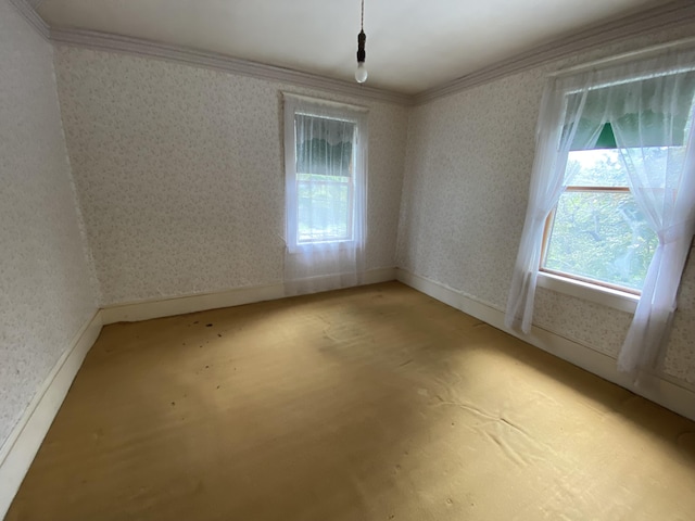 927 Van Buren Rd, Caswell, ME 04750 - unfurnished room featuring wallpapered walls, ornamental molding, and baseboards