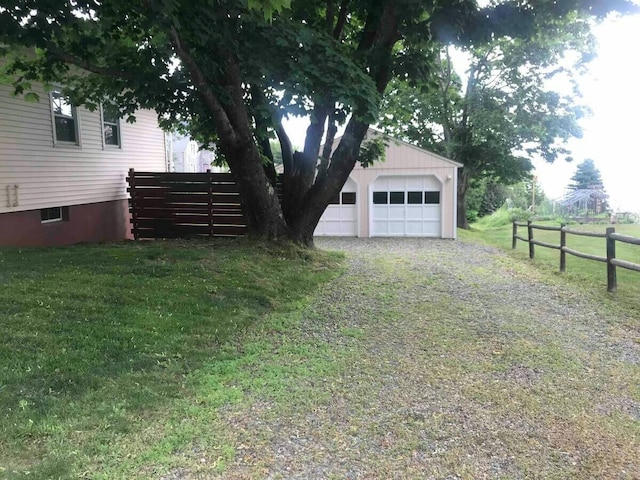 191 Water St, Eastport, ME 04631 - view of yard featuring a garage