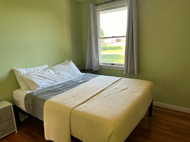 191 Water St, Eastport, ME 04631 - bedroom featuring wood finished floors and baseboards