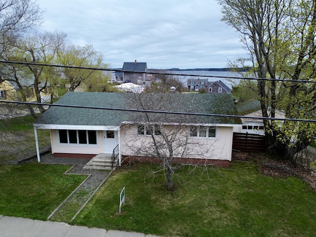 191 Water St, Eastport, ME 04631 - view of front facade with a shingled roof