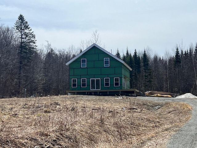 29 Oak Ridge Rd, Shirley, ME 04485 - view of front of property with a forest view