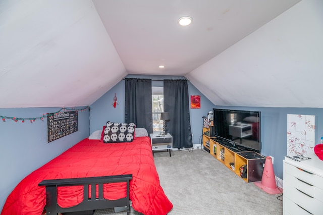 carpeted bedroom with recessed lighting, vaulted ceiling, and baseboards