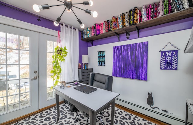 office space featuring a baseboard radiator and french doors