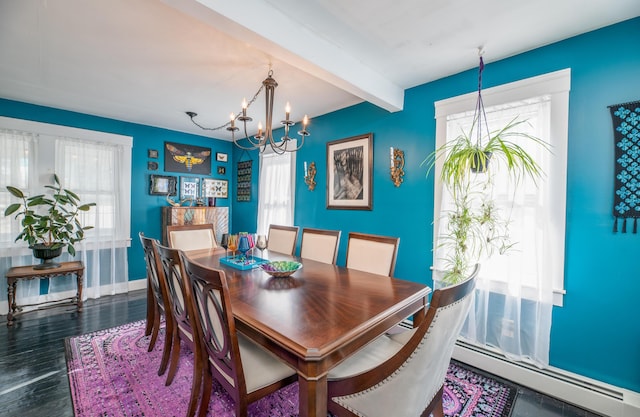 dining area featuring beam ceiling, a chandelier, baseboards, wood finished floors, and a baseboard radiator