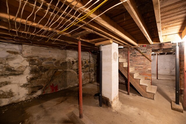 unfinished below grade area with stairway