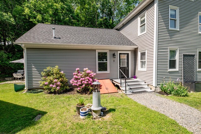 3 Adell Rd, Readfield, ME 04355 - view of front of home featuring roof with shingles and a front yard
