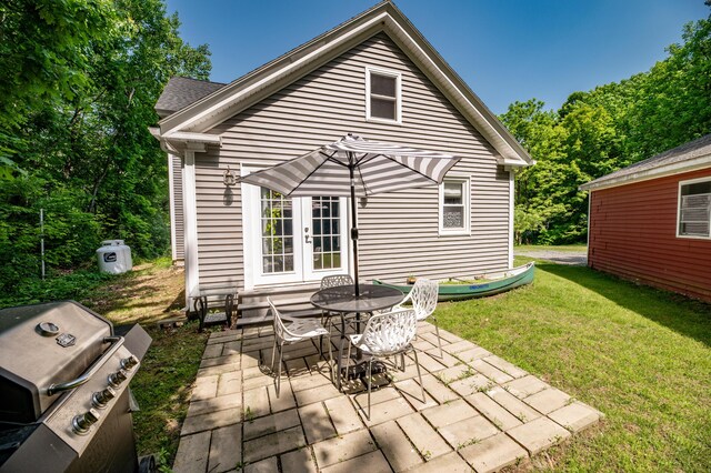 3 Adell Rd, Readfield, ME 04355 - view of patio featuring french doors, area for grilling, and outdoor dining space
