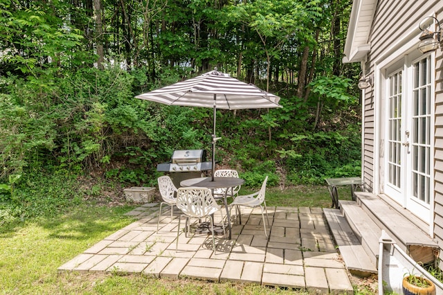 3 Adell Rd, Readfield, ME 04355 - view of patio / terrace featuring french doors and outdoor dining space